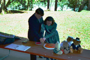 Cutting the cake.